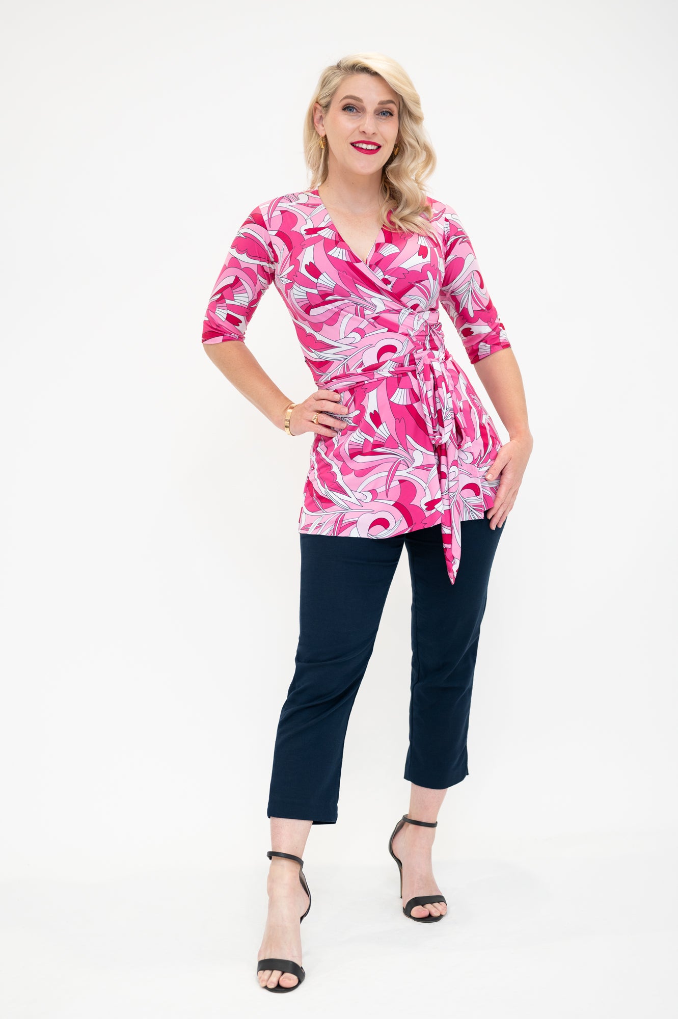 wrap top is pink retro print avaibale in plus size and regular sizes with 3/4 sleeves