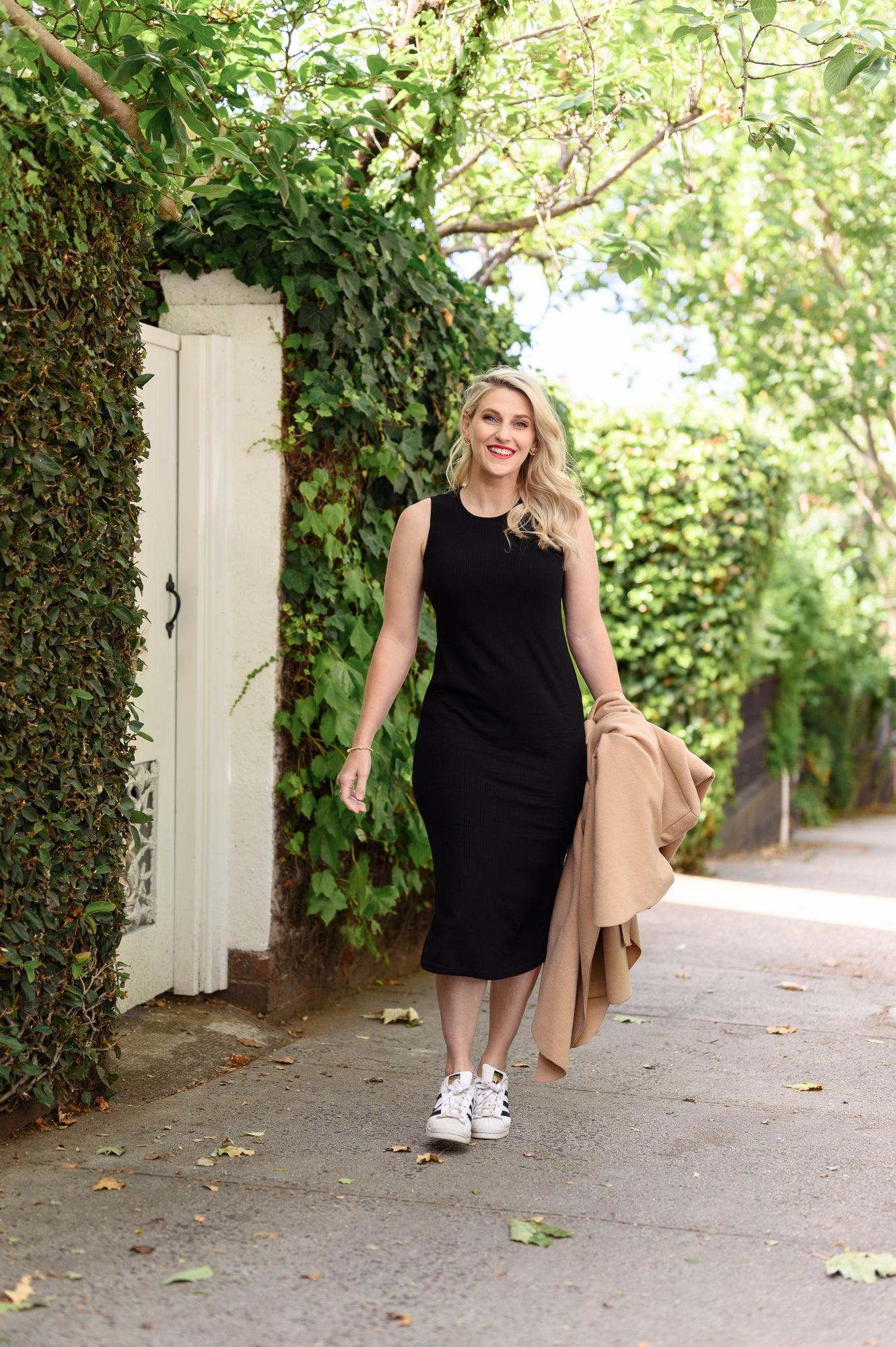 Black midi length body con dress