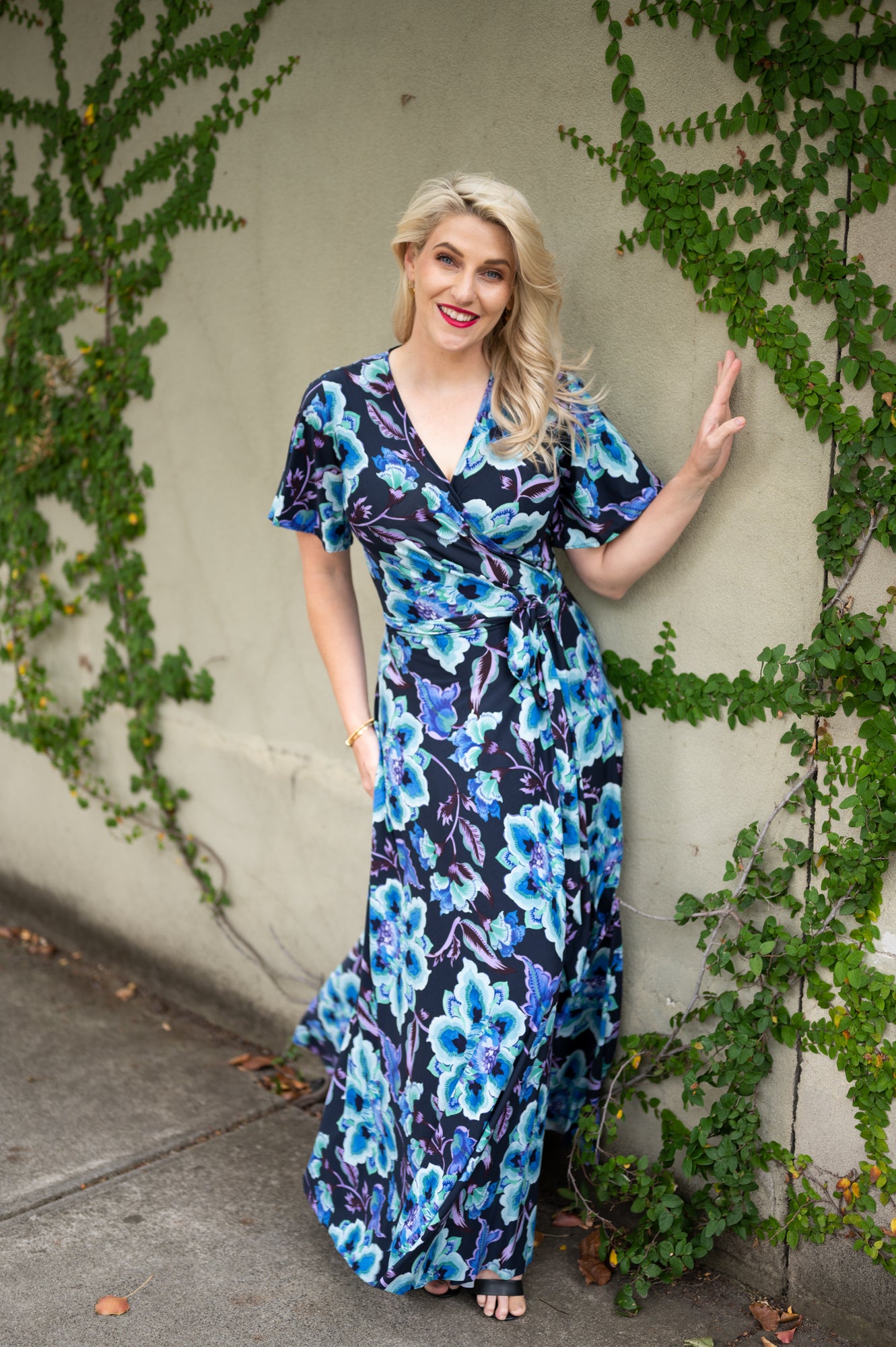 Wrap dress is available in regular and plus size dress options in flutter sleeve midi