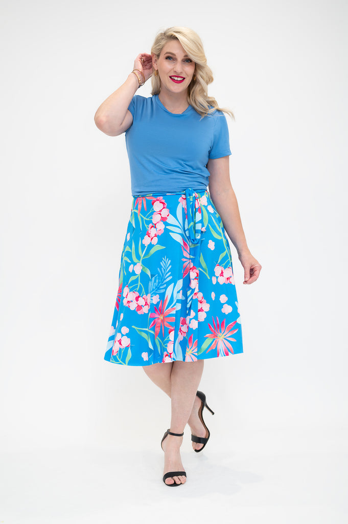 hydrangea Wrap skirt is available in regular and plus size dress options this variant is a knee length  