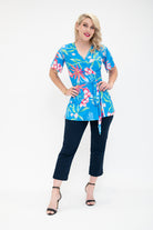 hydrangea Wrap top is available in regular and plus size dress options this variant is the flutter sleeve