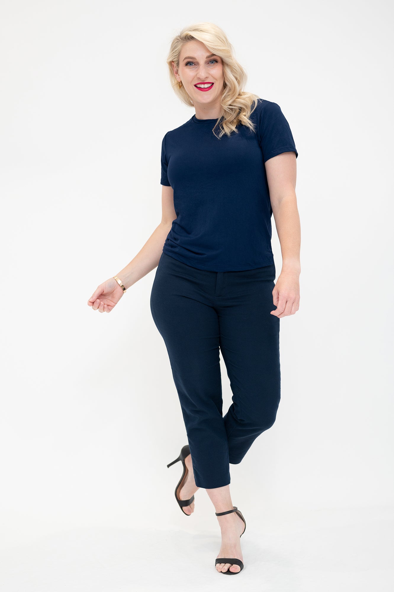 Woman wearing bamboo t-shirt in navy colour from By Samantha Melbourne. Curve-friendly fit, short sleeves, crew neck.