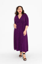 Wrap dress is available in regular and plus size dress options  sparkly wrap dress in midi with 3/4 sleeve  front
