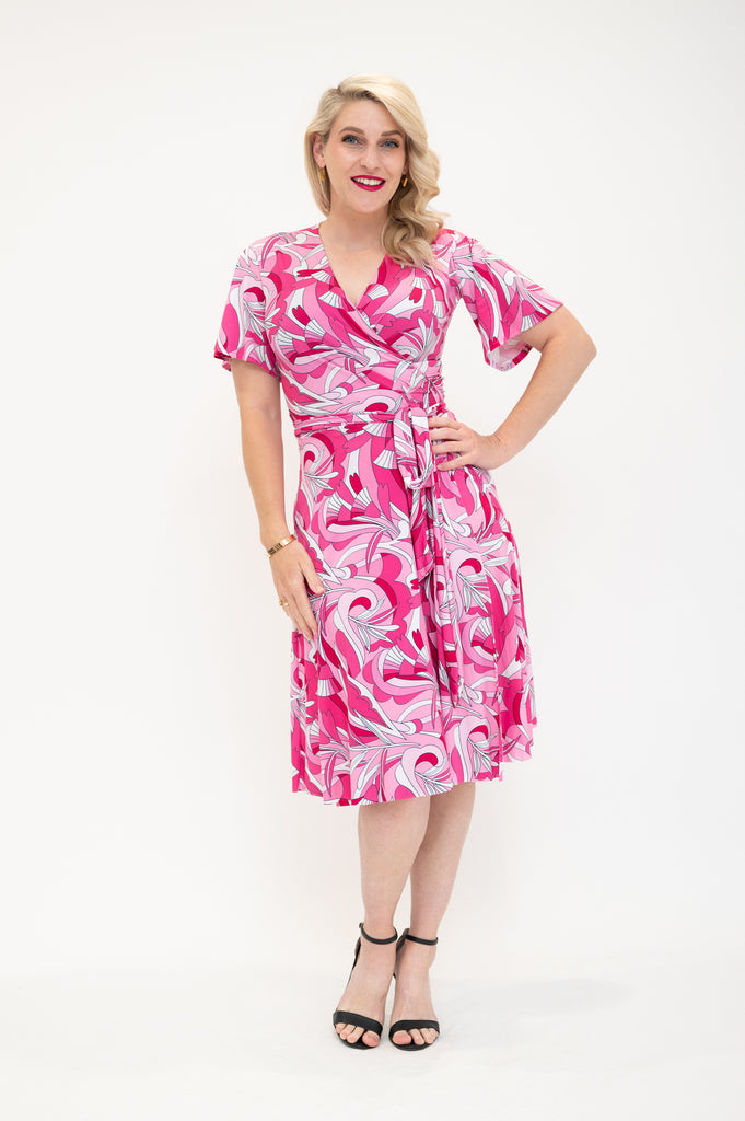 knee length  wrap dress with flutter sleeves  pink 