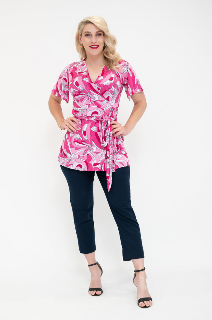 wrap top is pink retro print avaibale in plus size and  regular  sizes  with flutter sleeves 