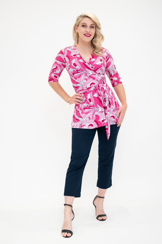 wrap top is pink retro print avaibale in plus size and  regular  sizes  with 3/4 sleeves 