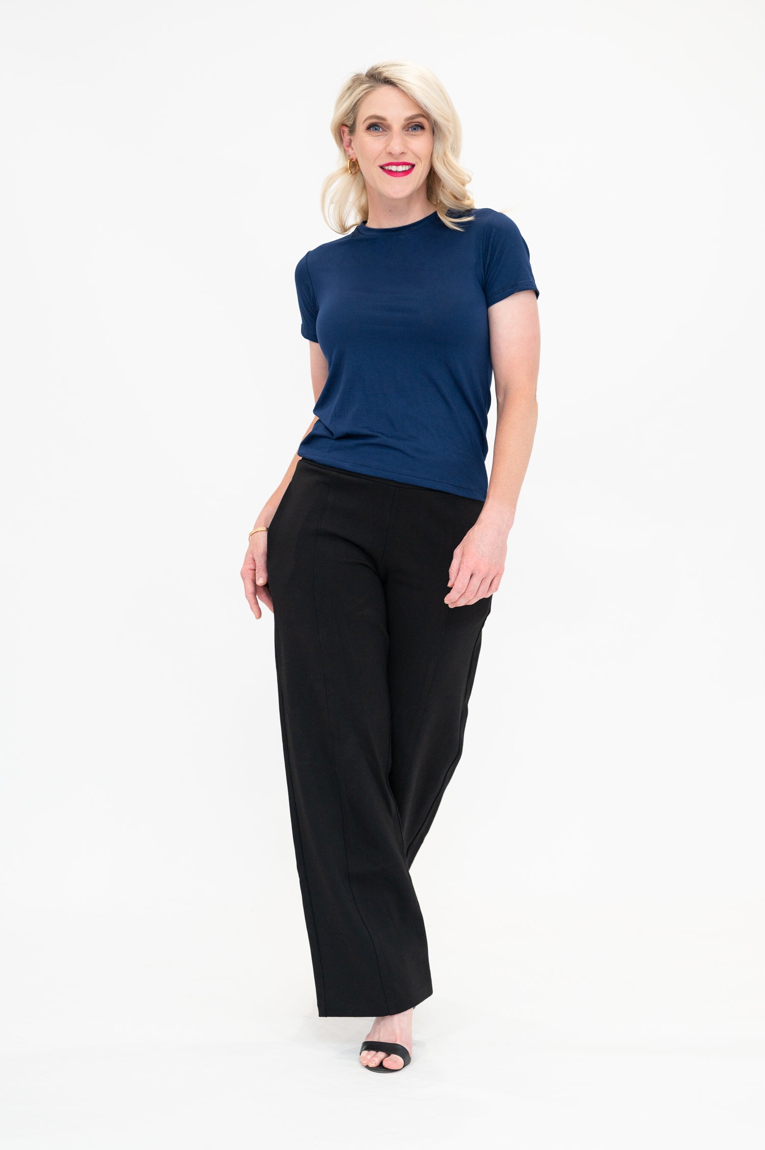 Woman wearing bamboo t-shirt in navy colour from By Samantha Melbourne. Curve-friendly fit, short sleeves, crew neck.