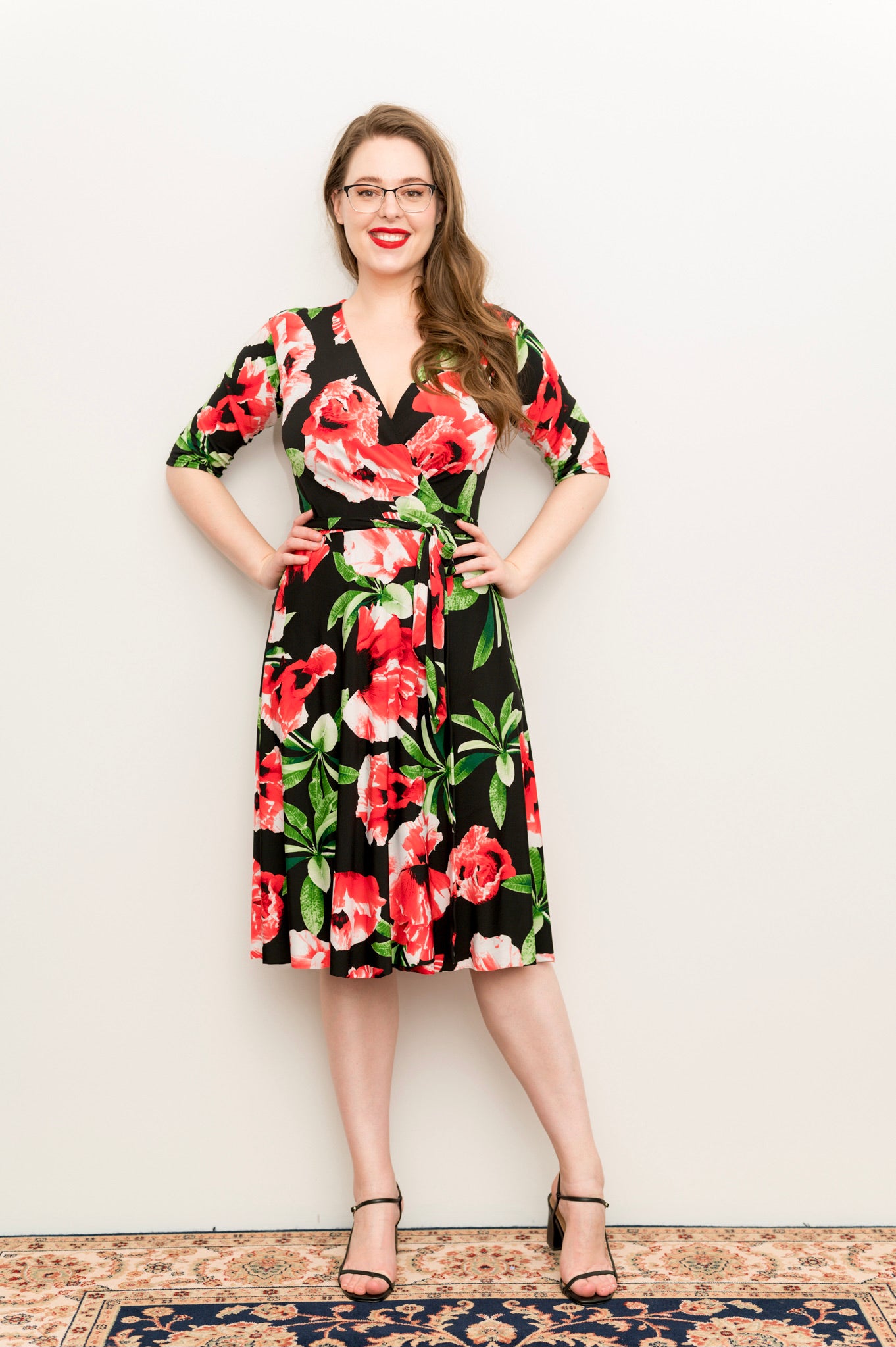 hibiscus Wrap dress is available in regular and plus size dress options - this variant is a knee length 3/4 sleeve  sleeve 