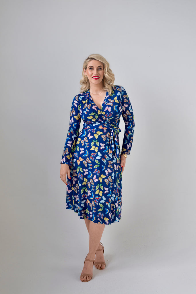 Butterfly themed  Wrap dress is available in regular and plus size dress options - this variant is a knee length  winter sleeve 