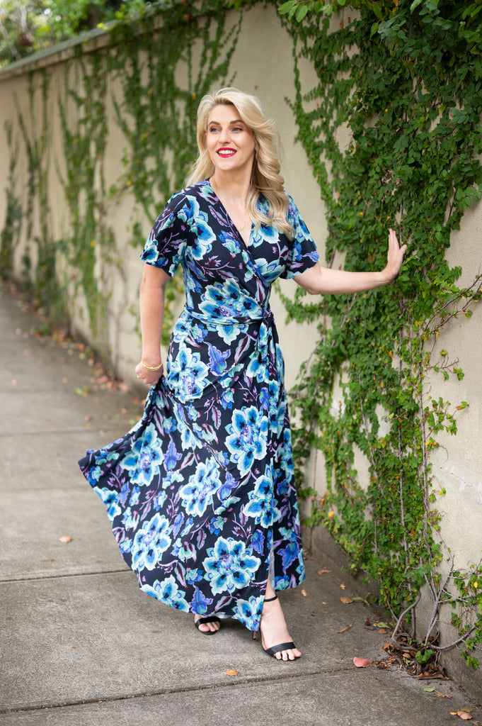 Wrap dress is available in regular and plus size dress options  in bebe print 