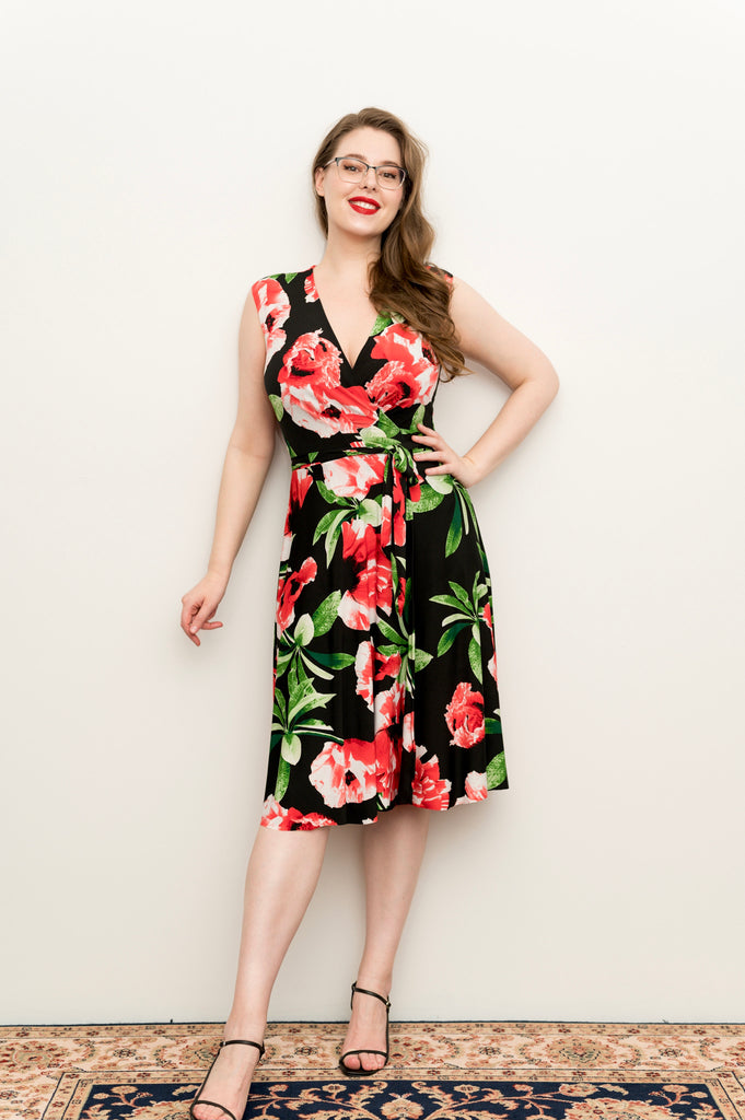 hibiscus Wrap dress is available in regular and plus size dress options - this variant is a knee length no  sleeve 