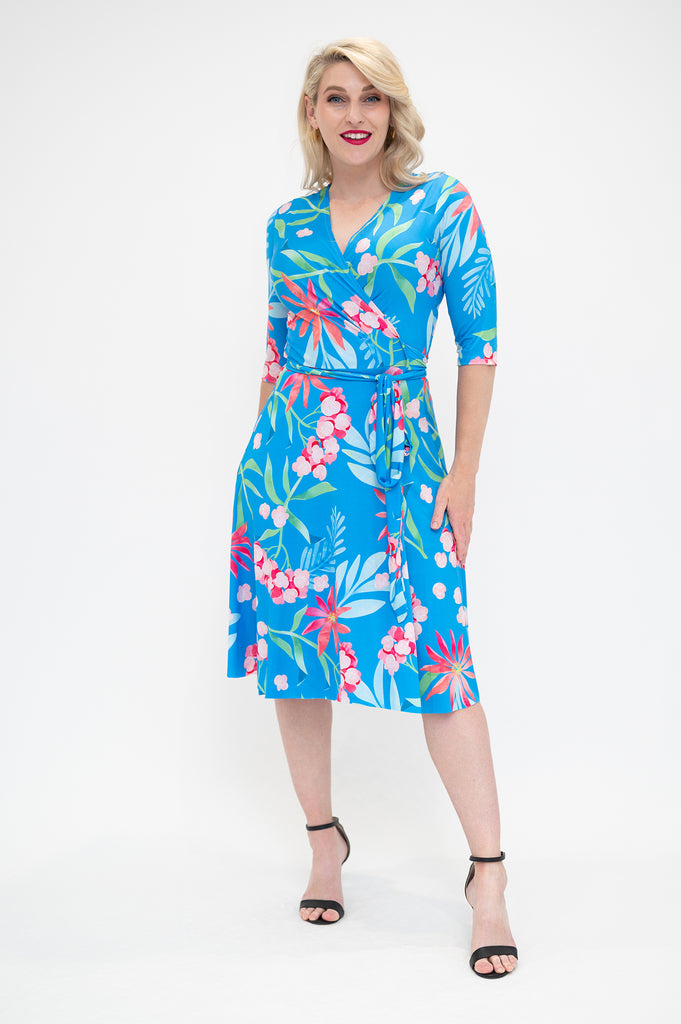 hydrangea themed  Wrap dress is available in regular and plus size dress options - this variant is a knee length  3/4 sleeve  front look 