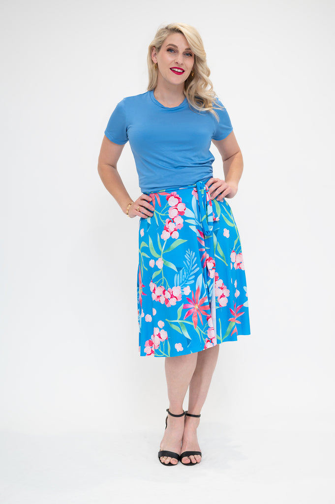 hydrangea Wrap skirt is available in regular and plus size dress options this variant is a knee length front view 