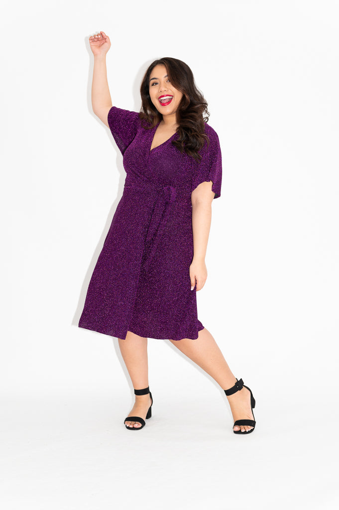 Wrap dress is available in regular and plus size dress options  sparkly wrap dress in knee length  with flutter sleeve  front 