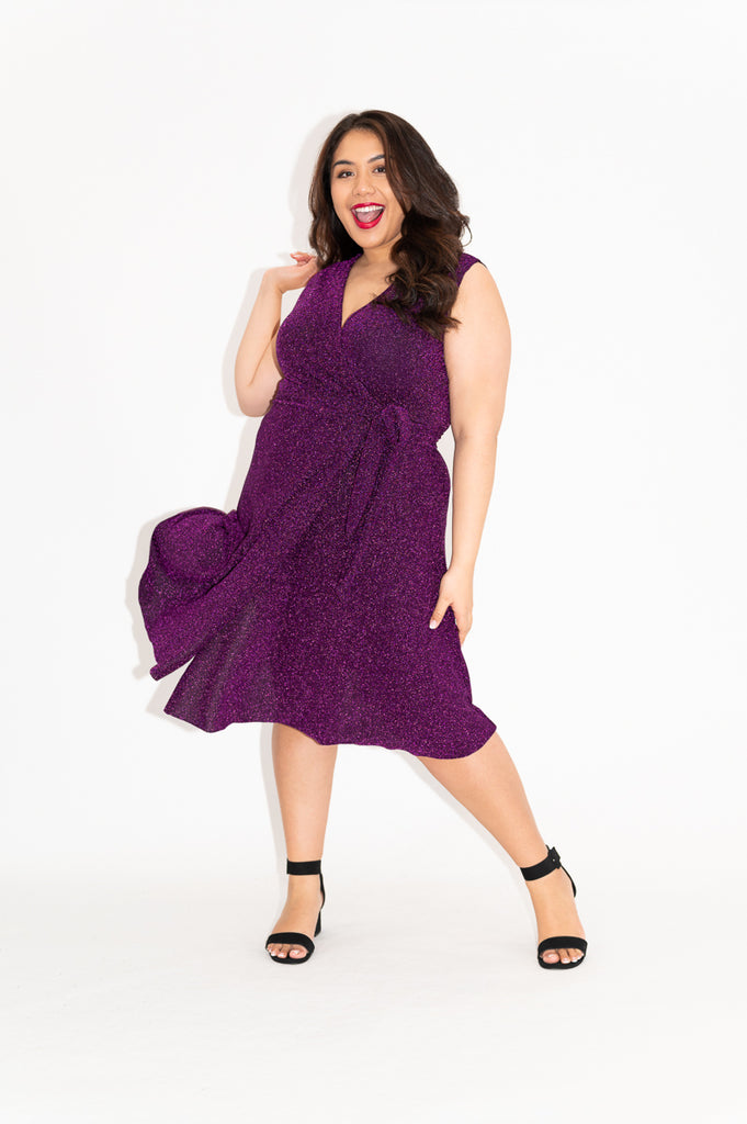 Wrap dress is available in regular and plus size dress options  sparkly wrap dress in knee length  with no sleeve  front 
