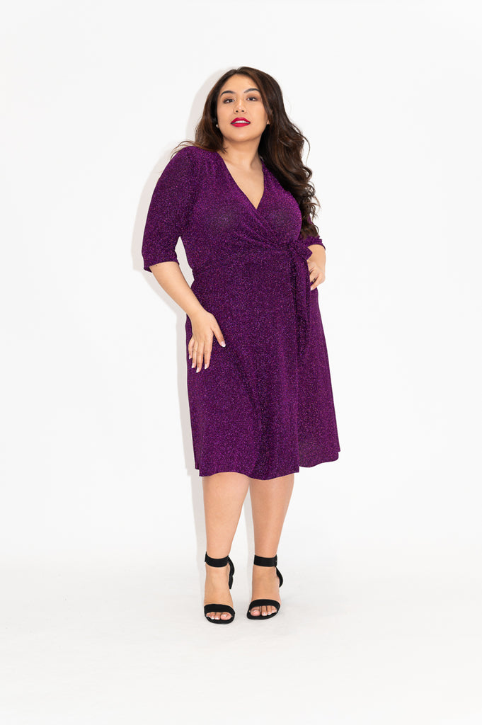 Wrap dress is available in regular and plus size dress options  sparkly wrap dress in knee length  with 3/4  sleeve  front 