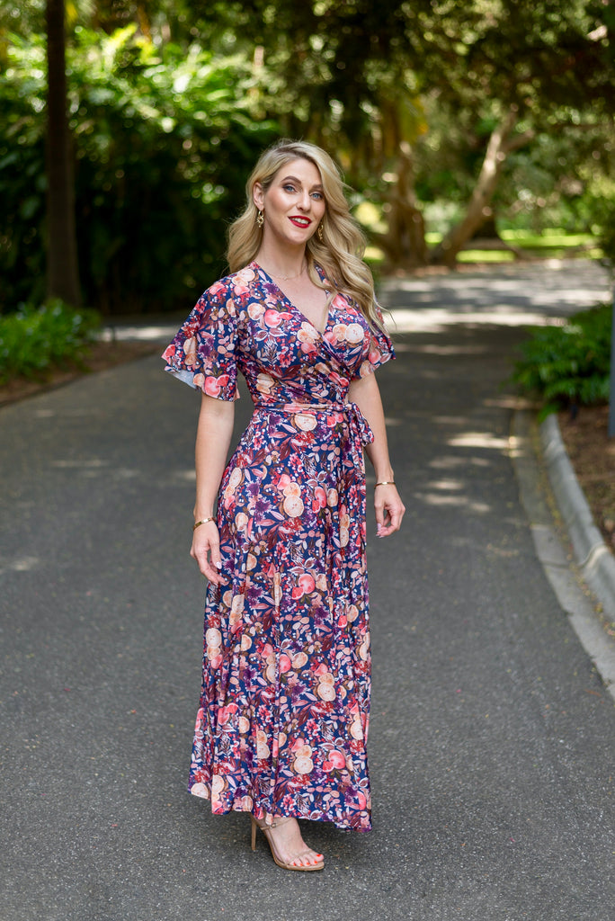 Wrap dress is available in regular and plus size dress options   wrap dress flutter sleeve 