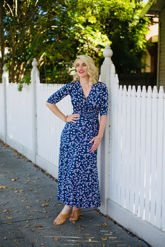 Wrap dress is available in regular and plus size dress options  3/4 sleeve midi 